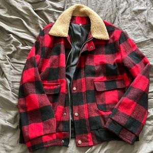 Red and black Lumberjack jacket with fur collar.